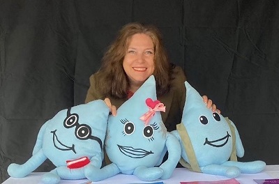 Tina Talbot with the Daring Droplets plushies, 2021