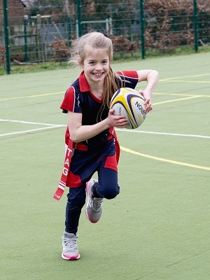 Happy girl running | Sport at Bowdon Prep