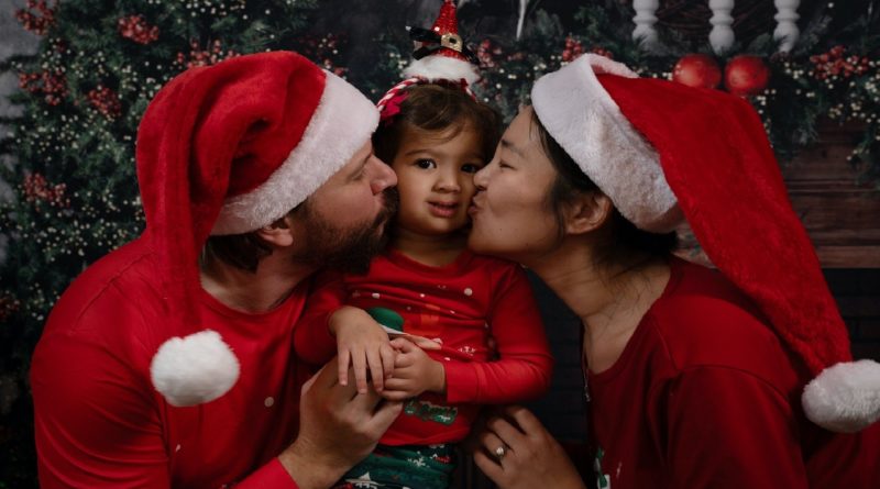 Christmas. Kissing the child