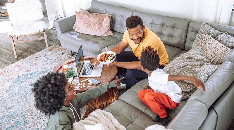 Family eating in the living room