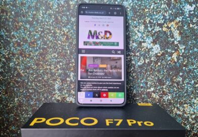 Mobile phone with M&D website on the screen