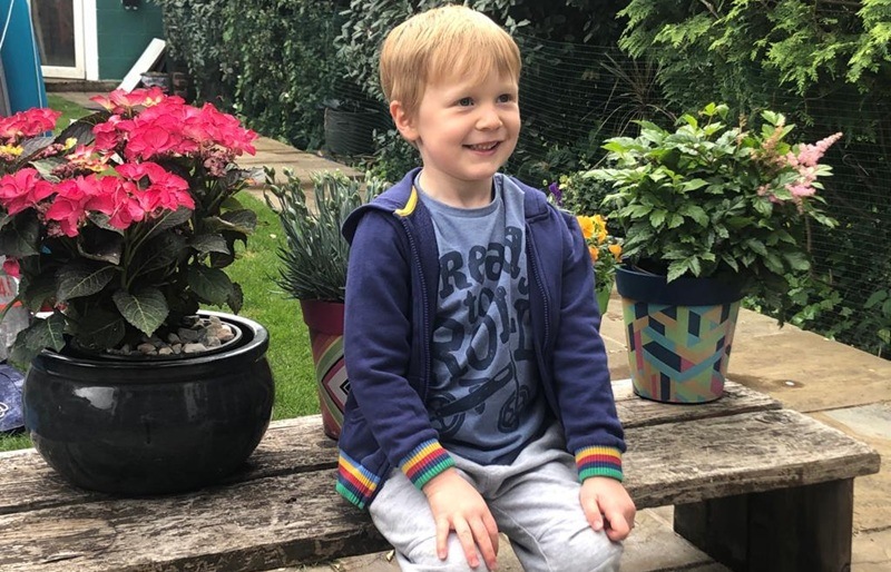 A boy and flowers