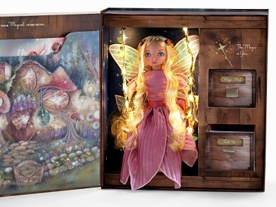 fairy doll inside the gift box, with lights on