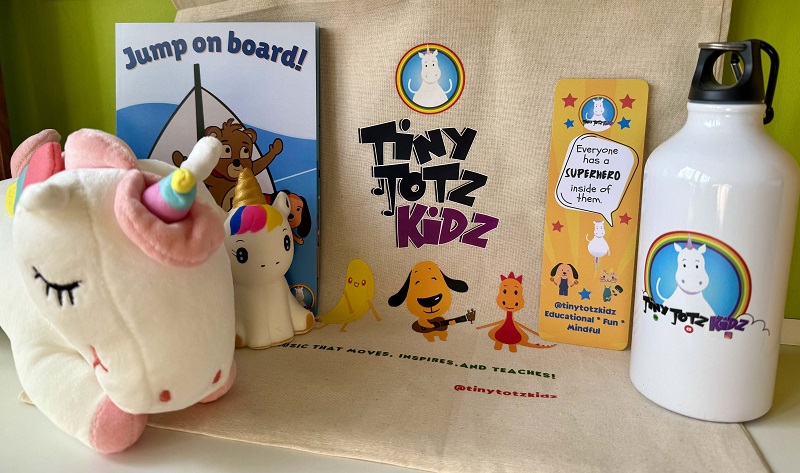 Tiny Totz Kidz competition prize. Gift bag includes unicorn plush, tote bag, water bottle and other items.