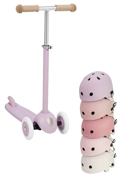 Banwood Eco scooter and helmets of different warm pastel colours