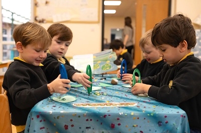 Children playing learning game at Greenbank Prep's lesson
