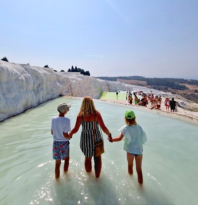 Pamukkale | Family is walking in the thermal pools