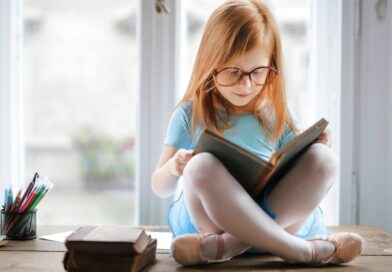 A girl in a ballet shoes reading a book | Photo by Andrea Piacquadio, pexels
