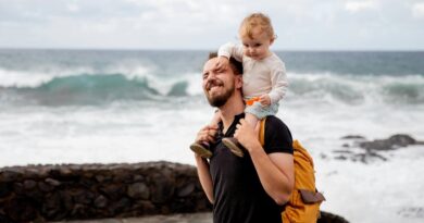 Father and toddler on the beech