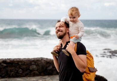 Father and toddler on the beech