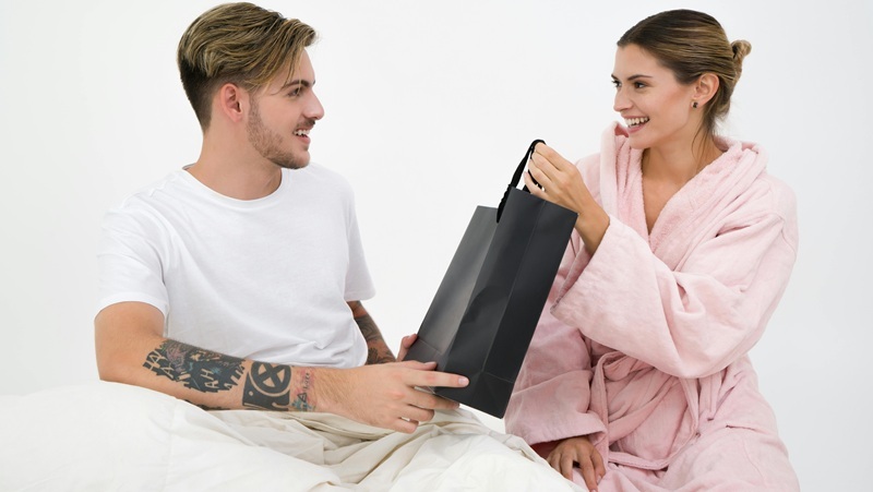 Young couple with a gift