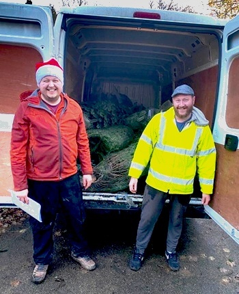 Volunteers from Mellor Country House delivering Christmas trees