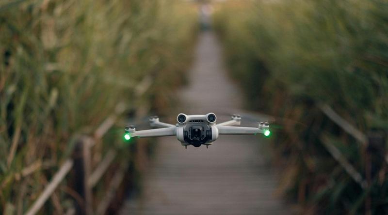 Flying drone with green lights