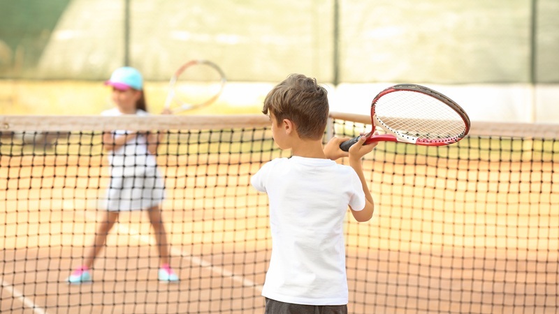 Children playing tennis