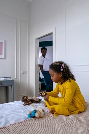 Girl with toys 