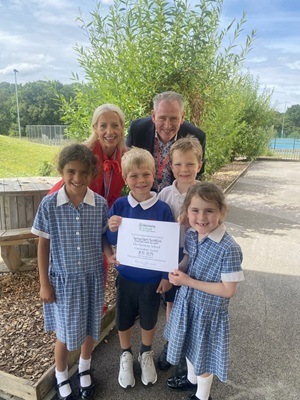 Harmony School certificate presented to King's School children