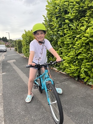 A girl ridding a bike