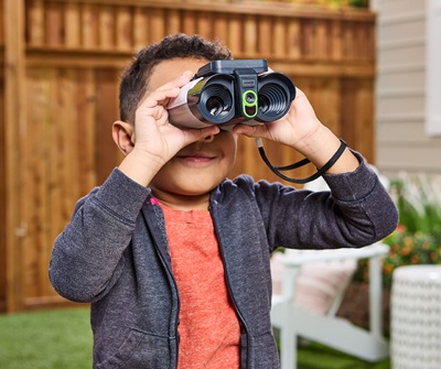 Boy outdoors with LeapFrog® Magic Adventures™ Binoculars