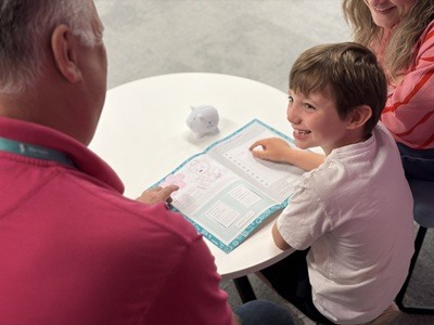 Boy with an activity book
