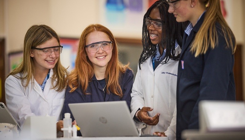 Girls in a laboratory. WGS