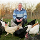 Mark with Chickens at the Farm