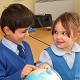 School Children with a Globe