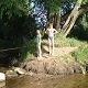 Kids playing at the waterside at Mersey Vale Nature Park