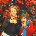 Children playing at the Christmas tree