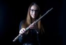 Kings Alumna Alex Clarke with her flute