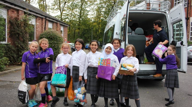 MHSG Prep girls load a van of food_v1