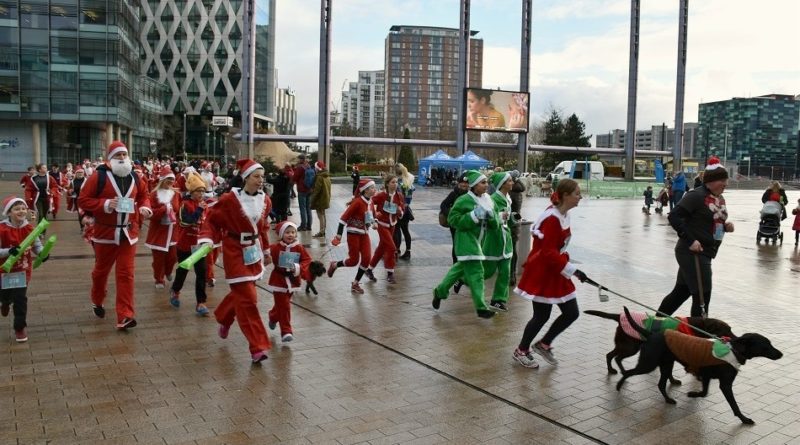 Santas running through MediaCityUK | Jingle Bee Jog, Manchester