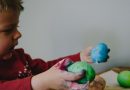 Boy playing with colour mold