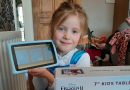 Girl unpacking 7inch kids tablet
