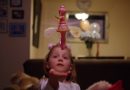 Girl is watching a flying fairy toy