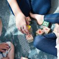 Playing alphabet cubes by Marisa Howenstine unsplash