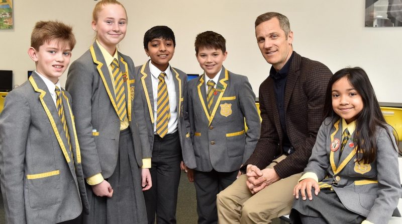 Children and Headteacher at Greenbank School