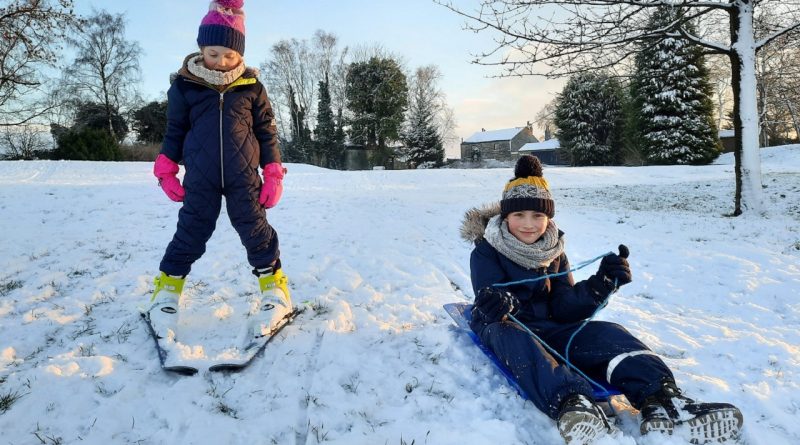 Kids on a snow hill