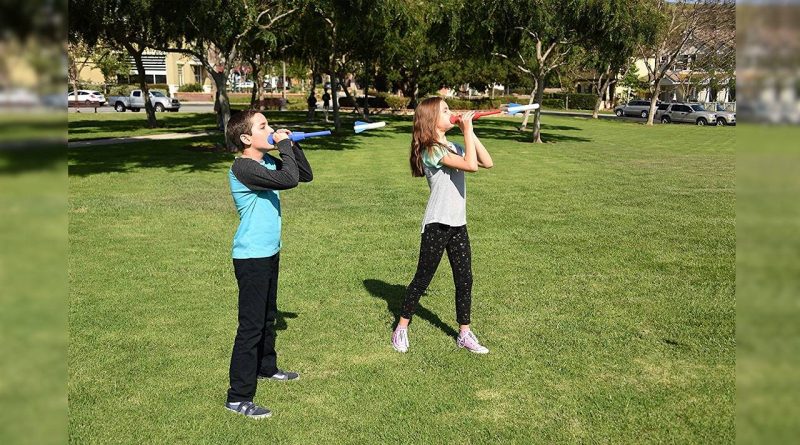 Kids playing with Stomp Rocket BLO