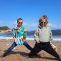 oy and girl on a beach