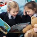 Girls reading book