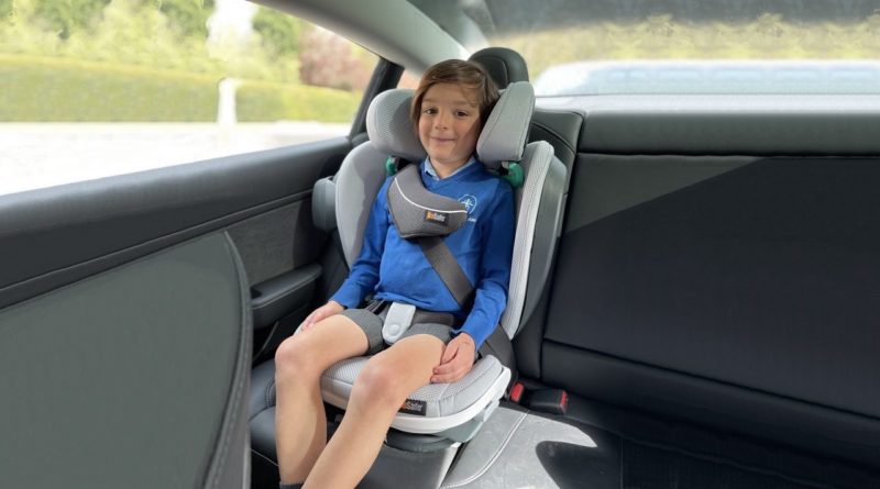 a boy in BeSafe iZi Flex FIX i Size booster seat