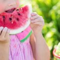 girl eating melon