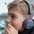 Boy with wireless head set