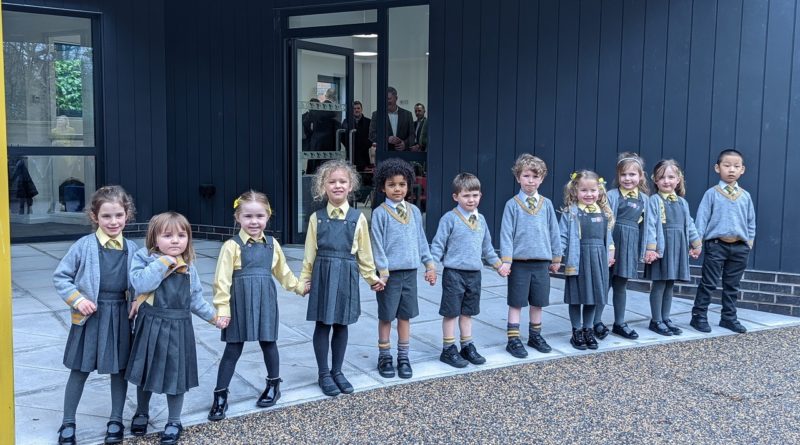 Children of Greenbank Prep waiting for their new classroom