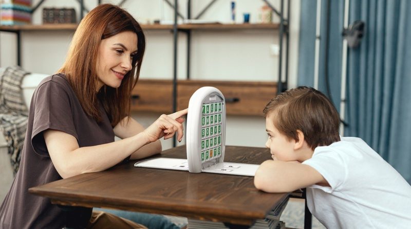 Parent and child playing Lex Match game