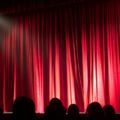 Theatre, stage curtains, photo by Monica Silvestre at pexels,