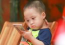 Child with smart phone