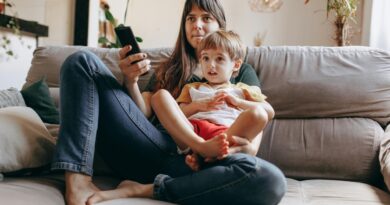 Mother and child watching TV