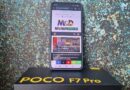 Mobile phone with M&D website on the screen