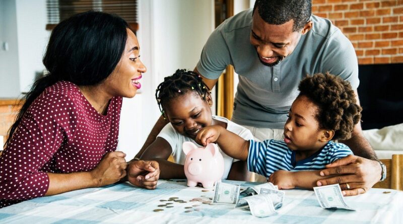 Parents teaching kids about money saving